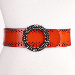 Orange genuine leather women's belt no hole with detailed perforations and round beaded buckle, designed for dress fashion.