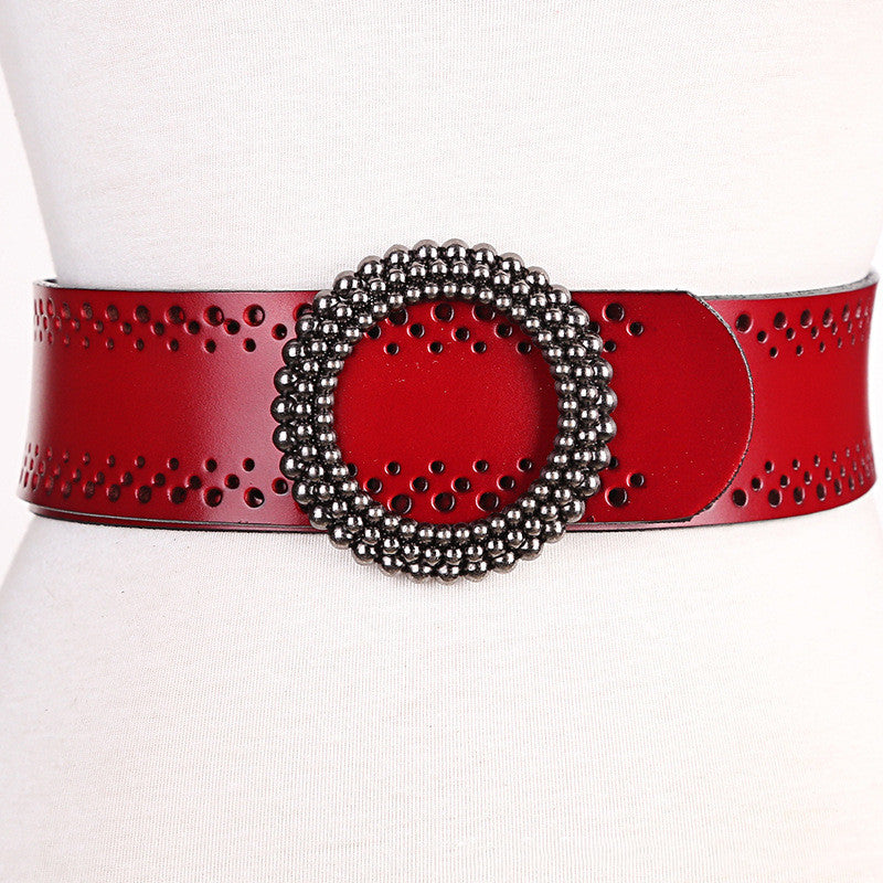Red genuine leather women's belt no hole featuring a round beaded buckle, perfect for accessorizing dresses stylishly.