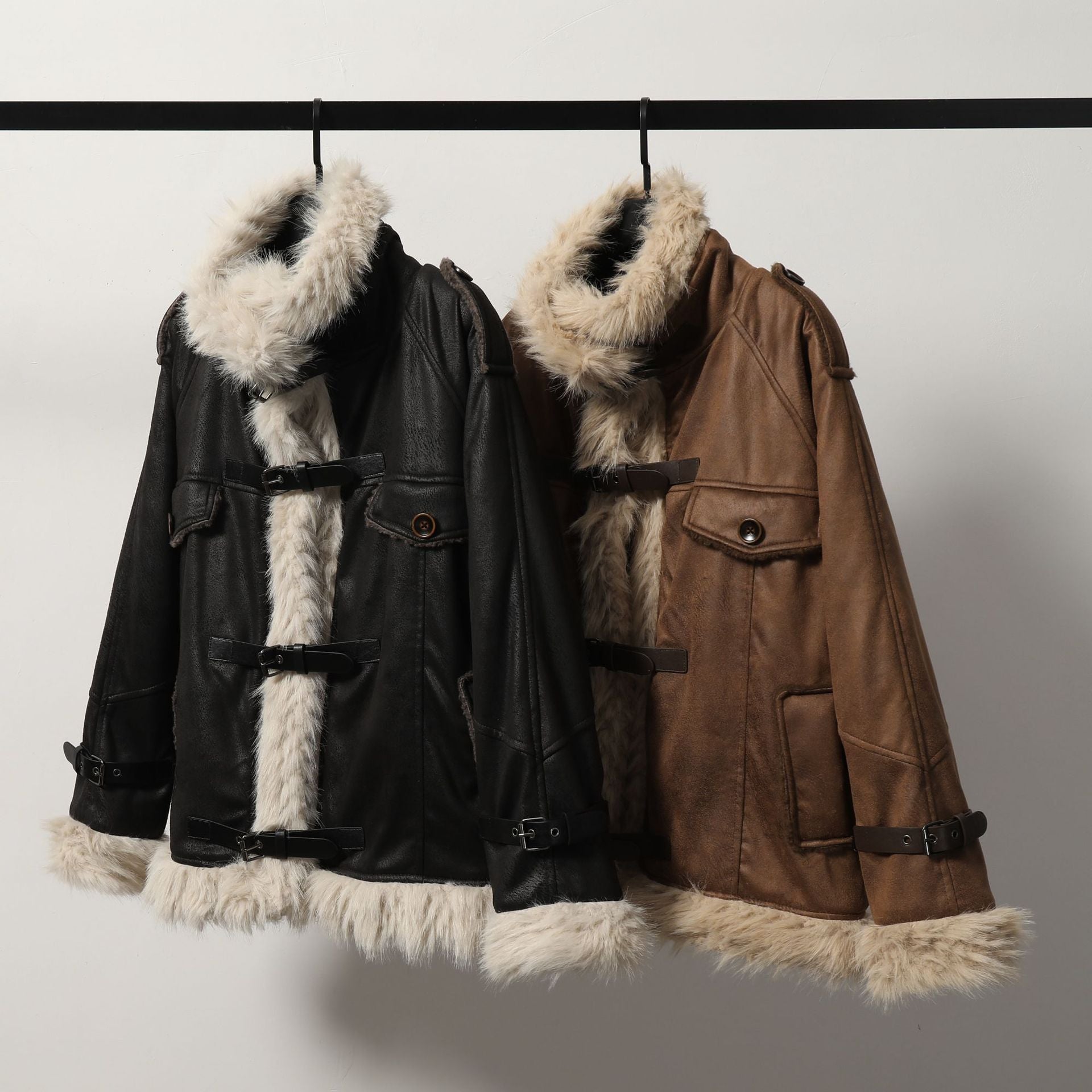 Black and brown Leather Coat with wool cotton blend, featuring faux fur trim and toggle closures, available in sizes S to XL.